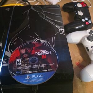 Sony PS4 Console with Black and White Controllers